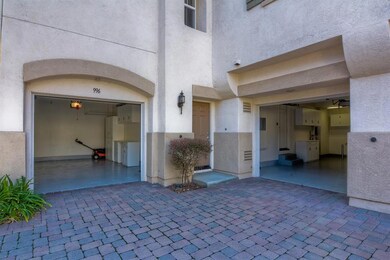 2 single car garages. Epoxy floors, built-in cabinets, utility sink, laundry