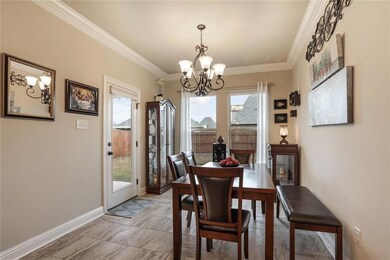 Dining room with back door leading out to the back