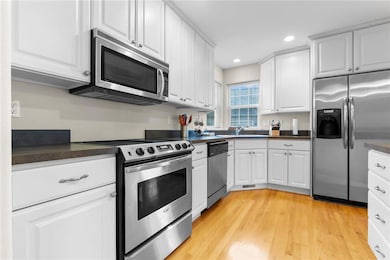 Bright and cheery kitchen with stainless steel app