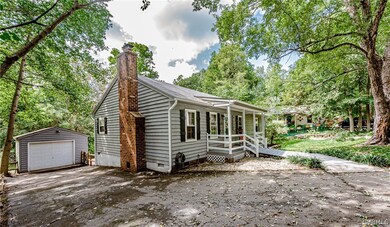 Detached Garage, Paved Driveway, Covered Front Por