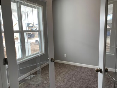 The flex room is a great place for an office for those who like to stay organized, play area for the kids, or just a place to sit down and read that book you've been meaning to read. Model photo.