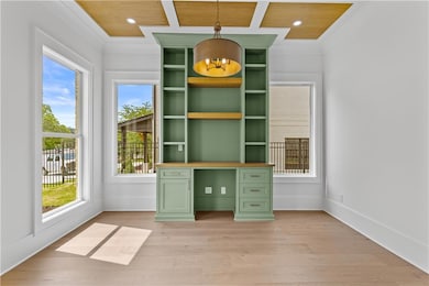Unfurnished office with light wood-style floors, wooden ceiling, baseboards, and recessed lighting
