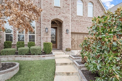 Well-maintained landscaped front yard