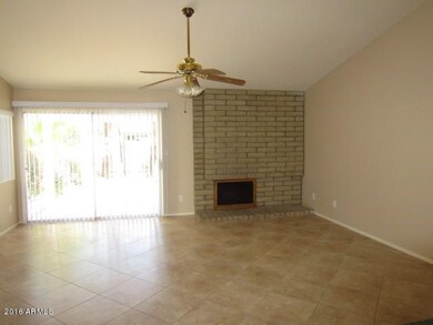 VAULTED FAMILY ROOM WITH FIREPLACE