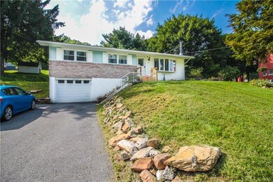 Beautiful Raised Ranch on over a half acre!