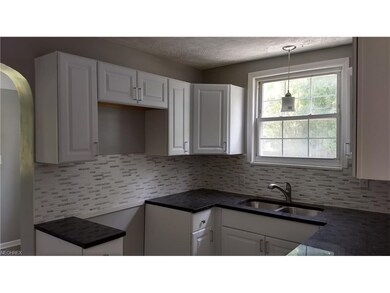 Updated kitchen with granite, ceramic tile and new