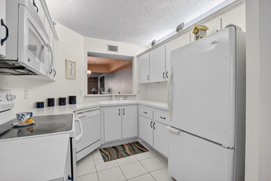 23249 Barwood Ln N unit 405, Boca Raton, FL 33428 - photo 2