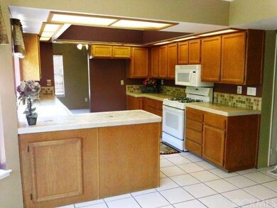 bright kitchen with lots of cabinets