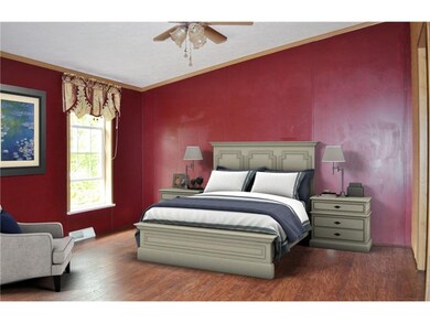 The master bedroom offers privacy with it's own ba