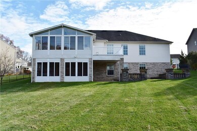 Rear of home and yard. Walk out of the basement th