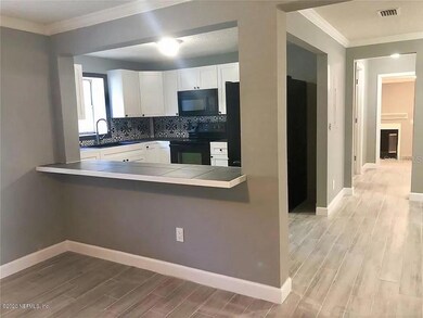 7042 Arlet Dr, Jacksonville, FL 32211 - photo 6