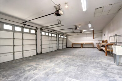 SEPARATE DETACHED 3-CAR GARAGE WITH KEY CODE ENTRY