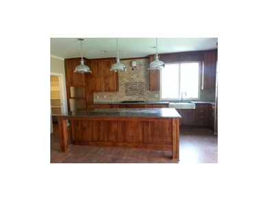 Spacious Kitchen with huge Granite Center Island, 