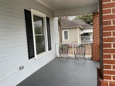 View of patio with a porch