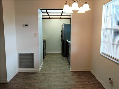 View of dining area nd kitchen from entry