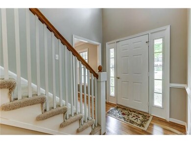 Grand 2 story entrance with beautifully finished h