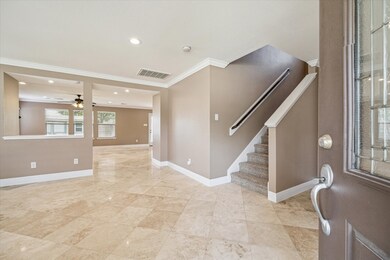 Enjoy natural stone tile throughout the first floor.