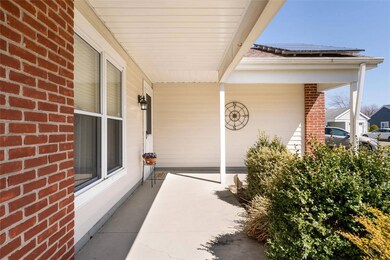 View of patio with covered porch