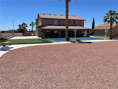 Back of property with an area to practice putting,