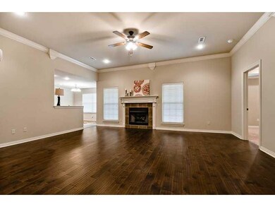 Living Room. Yes, the living room is large with beautiful floors!