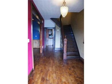 Entry/Foyer. Gleaming hickory hardwood plank floor