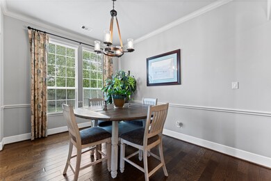 The dining area is roomy enough to accommodate a large table for entertaining guests.