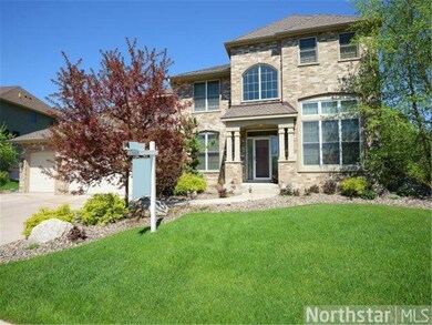 PRESTIGIOUS 2-STORY WALK-OUT IN GREAT MAPLE GROVE 
