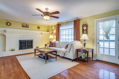 Wonderful den with masonry fireplace and views gal