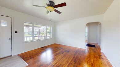 Living room, hallway leads into three bedrooms and