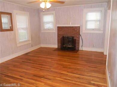 Living Room. The living room has a fireplace with gas logs.