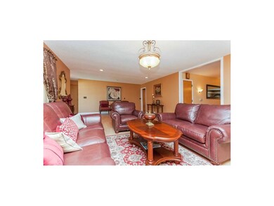 Formal Living Room with Foyer in Background