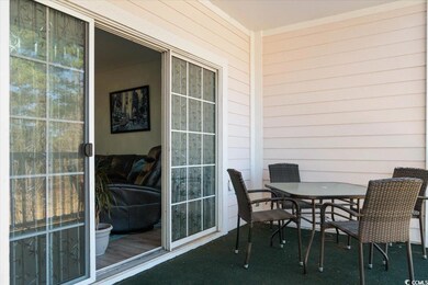 Balcony featuring outdoor dining area