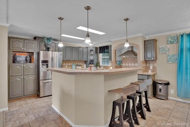 Kitchen featuring appliances with stainless steel 