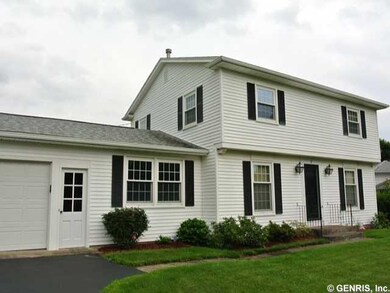 Exterior Front Newer vinyl siding - widows & roof