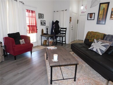 LIVINGROOM WITH NEWER FLOORING