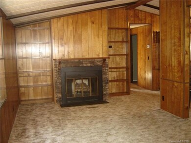 Spacious living room with fireplace