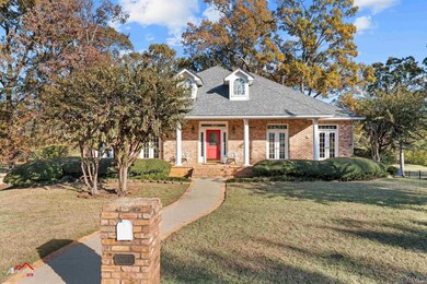 View of front of property with a front lawn