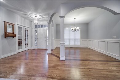 Entry and formal dining room with wood floors!