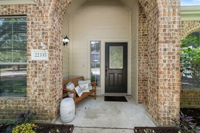 Relax on the cozy covered front porch and enjoy th