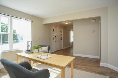 This gorgeous new flooring runs throughout this fl