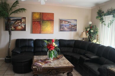 Living room is large enough for larger furniture.
