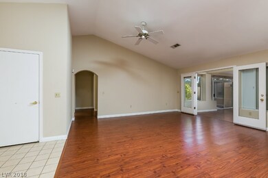 Living Room With Laminate Flooring, Vaulted Ceilin