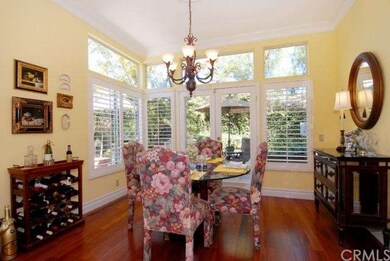 The dining room, kitchen and family room feature t