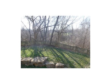 View from deck overlooking unusual backyard layout