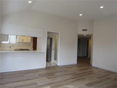 From Living Room Patio Door looking toward Breakfast Bar and Kitchen