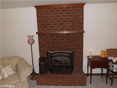 Living Room - Brick Fireplace in Living Room