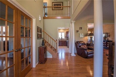 A Lovely Entry Hall with French Doors to the Offic