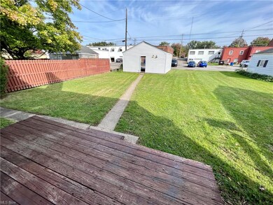 Back of building and 2 car garage