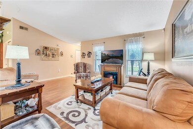 Looking from the hall to the secondary bedrooms to the formal living room and foyer.