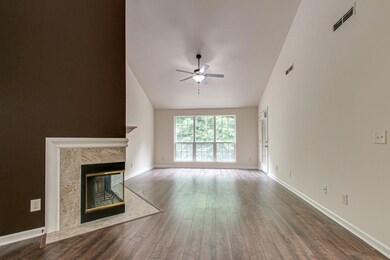 Sunlight bounces off of the brand new hardwood floors in this great space!